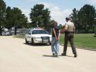 Man being arrested for Dui SR-22